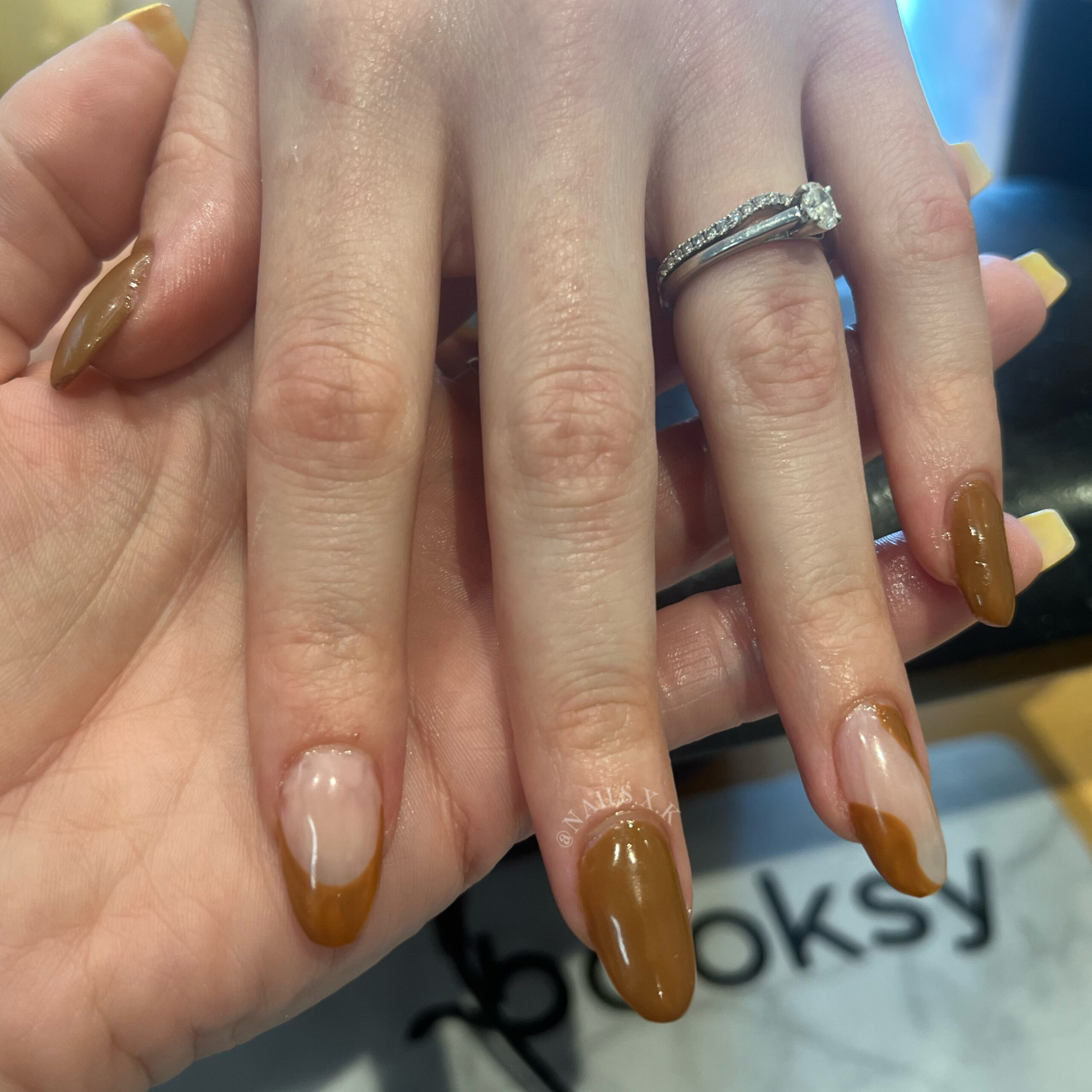 Medium hard gel set with brown and nude design. Nails by K