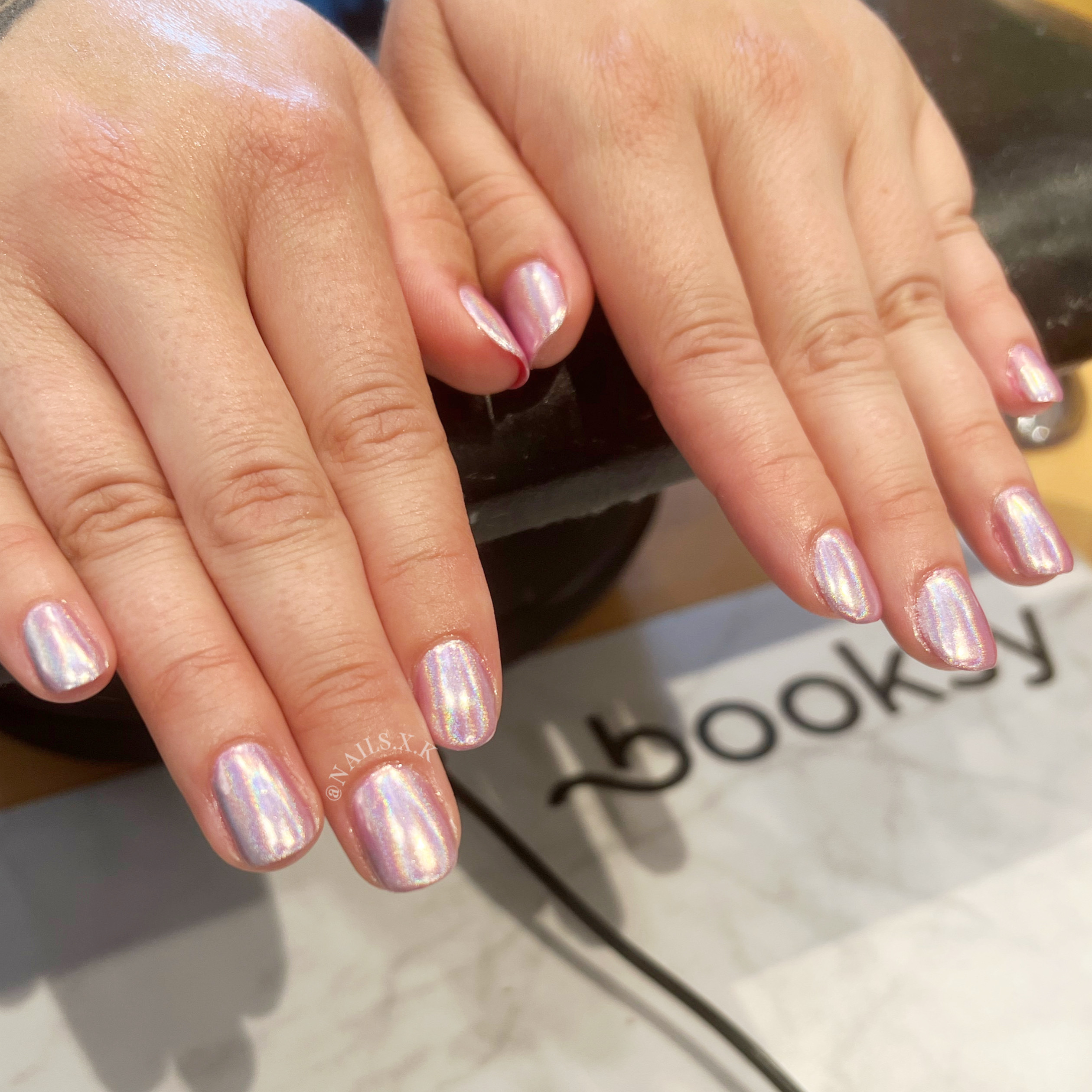 Gel manicure with pink holographic chrome. Nails by K