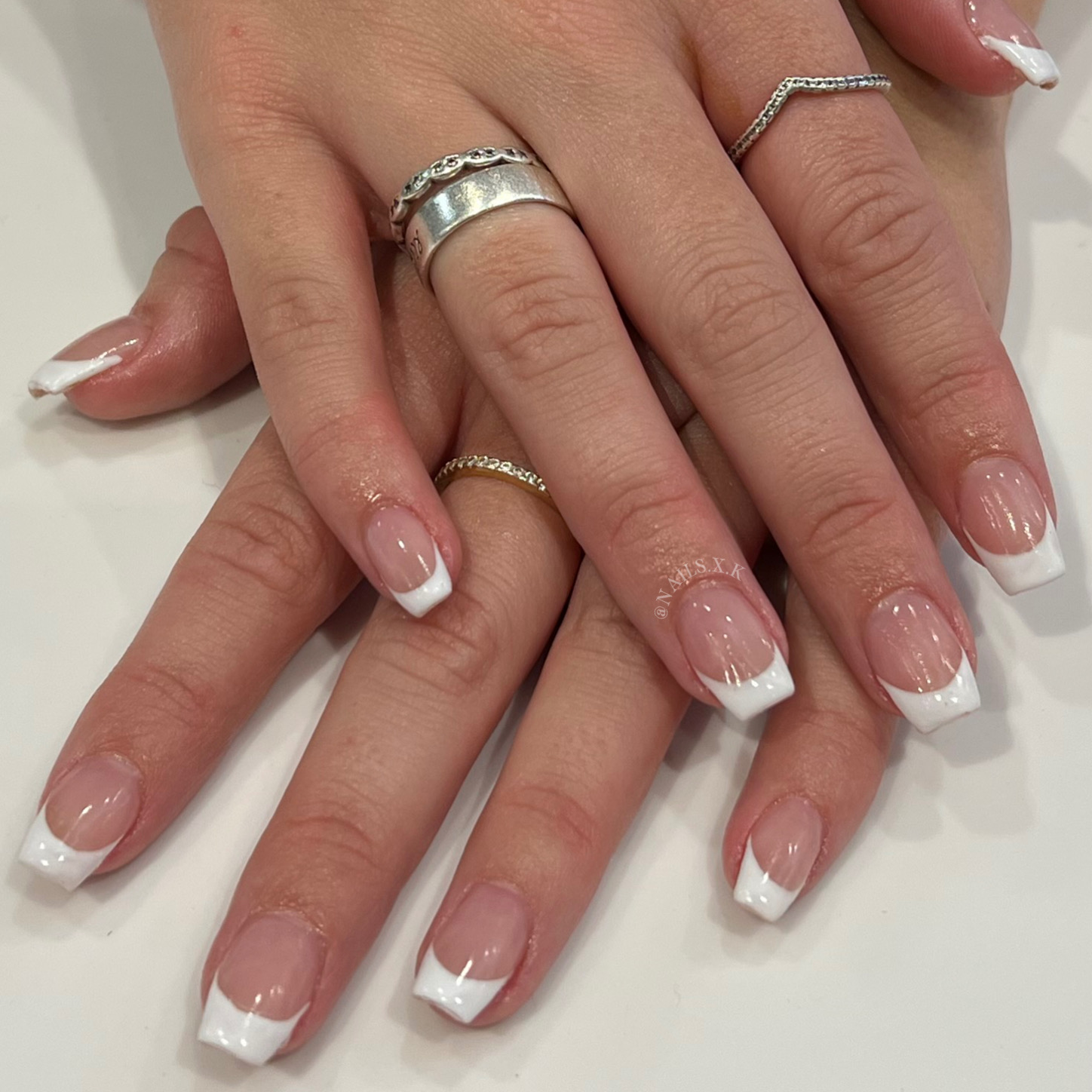Acrylic overlay with the classic french tips. Nails by K
