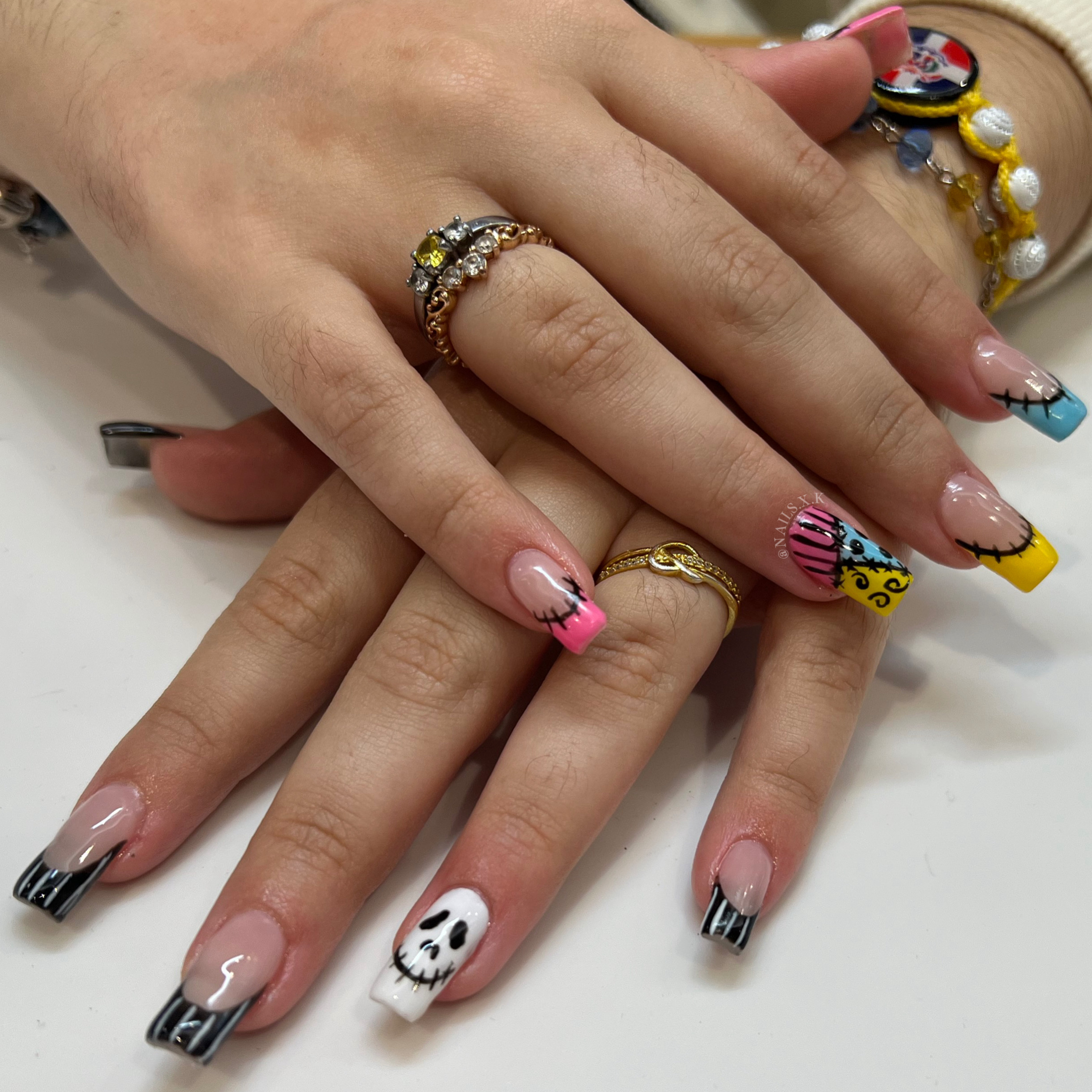 Hard gel fill with hand painted Jack and Sally art. Nails by K