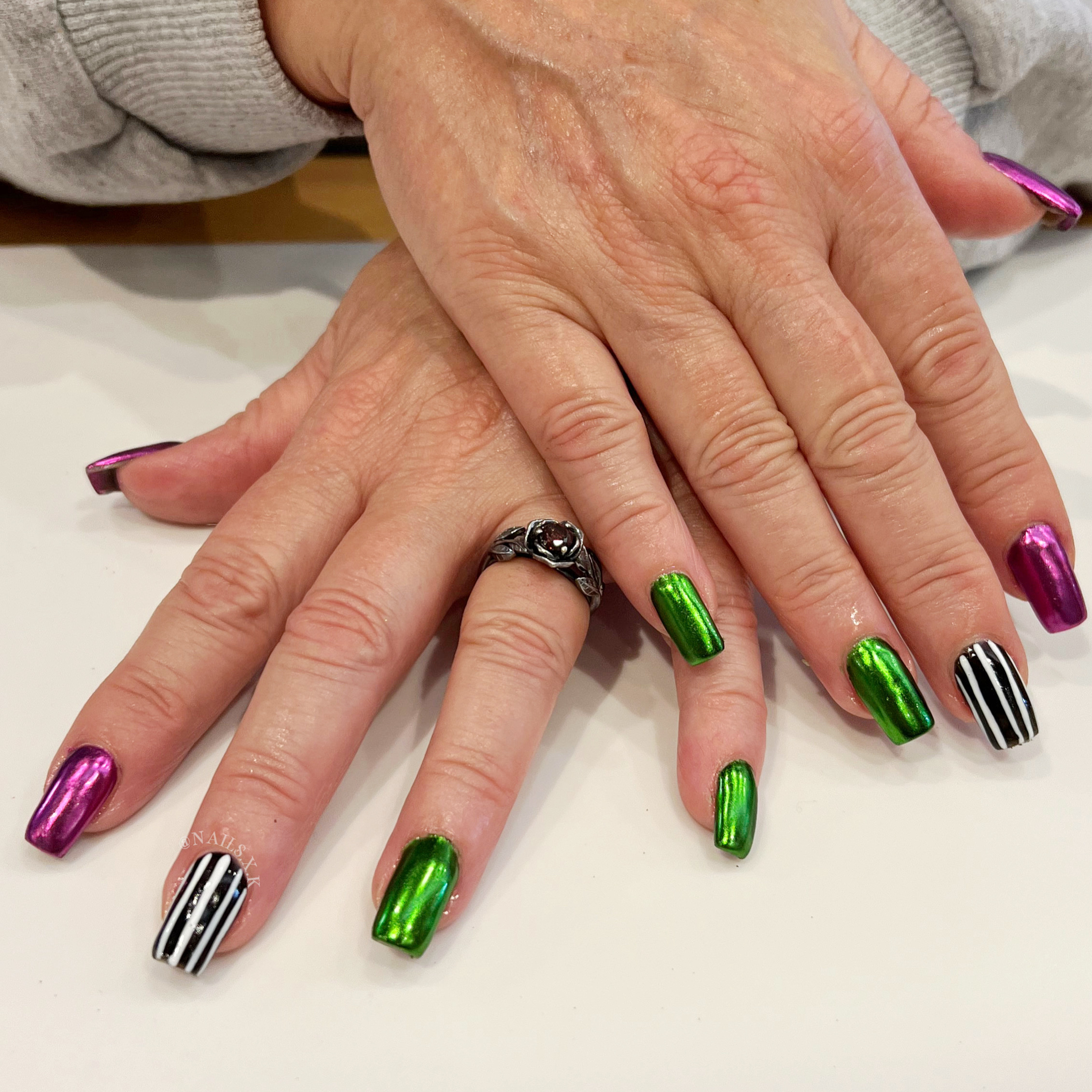 Beetlejuice inspired hard gel nail fill. Nails by K