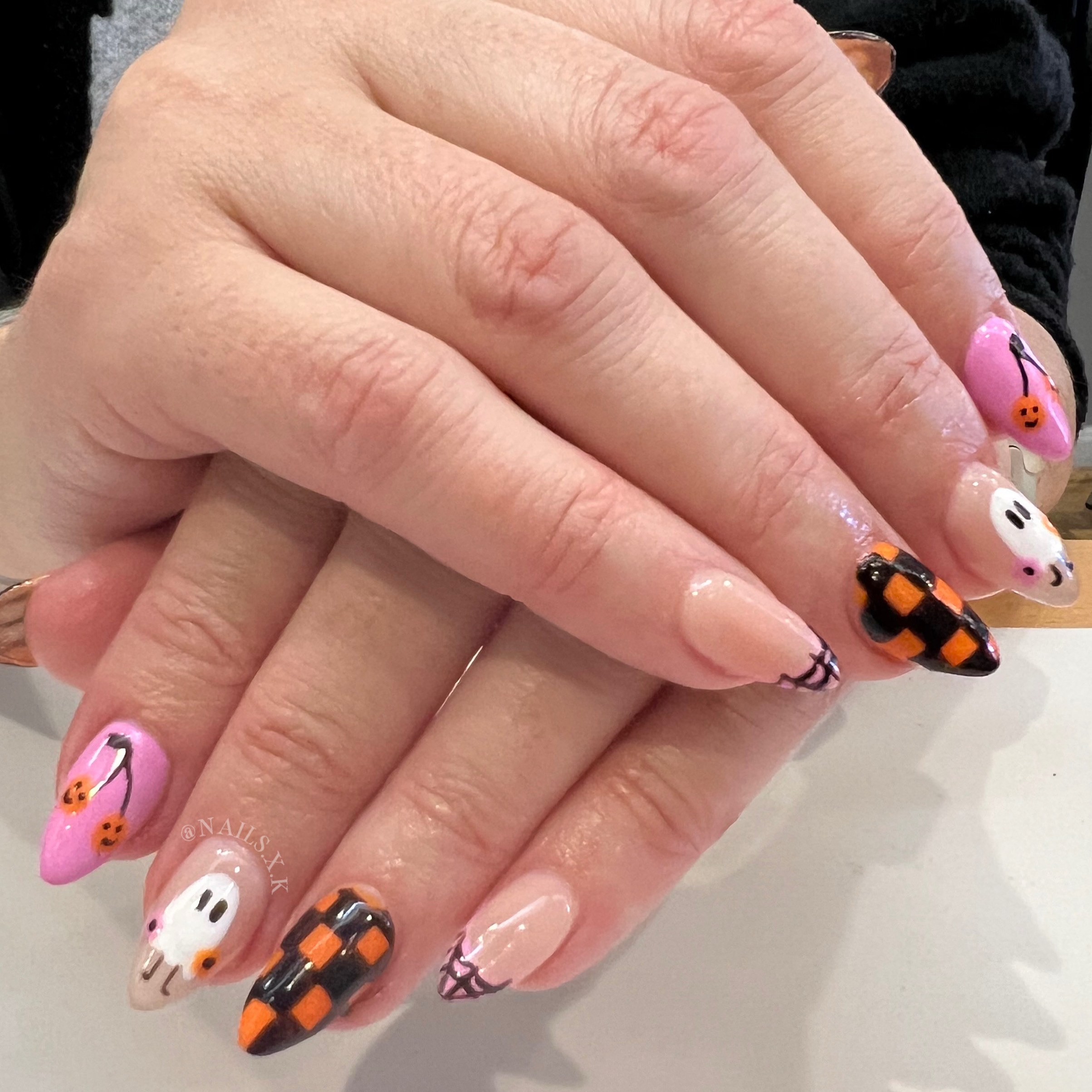 Acrylic nails with hand painted colorful Halloween art. Nails by K