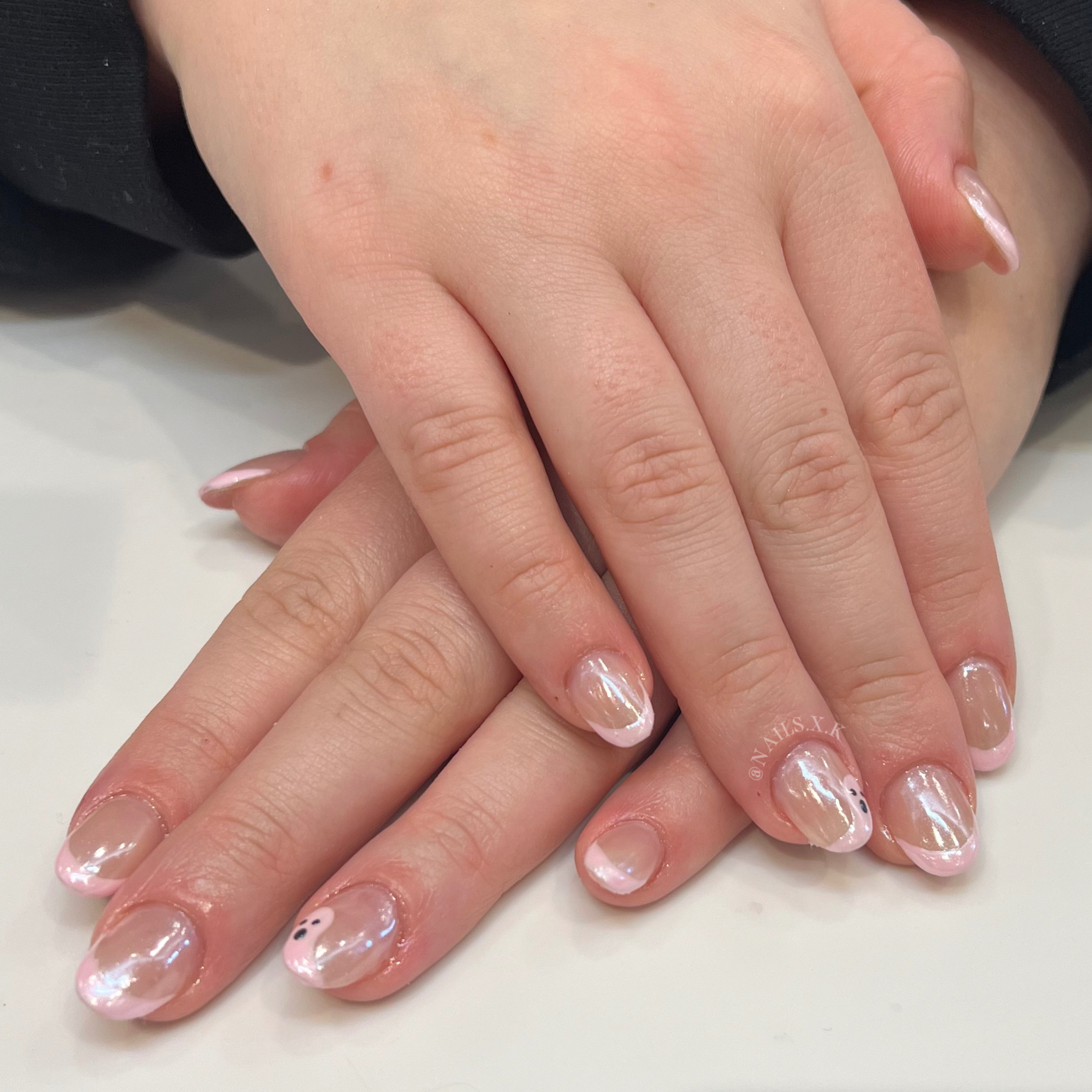 Acrylic nails with french tips and pearl chrome and ghost accents. Nails by K