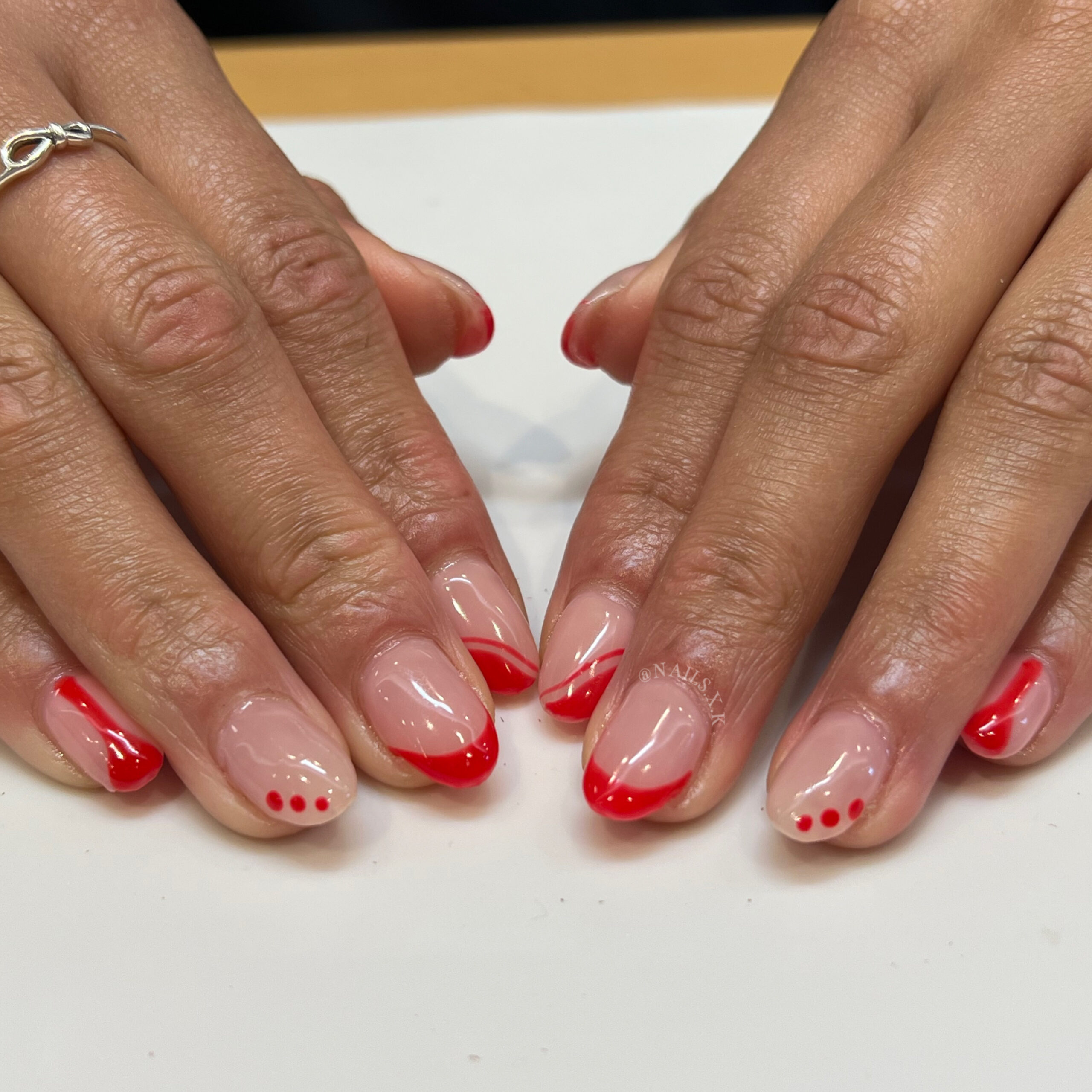 Hard gel with red nail design. Nails by K