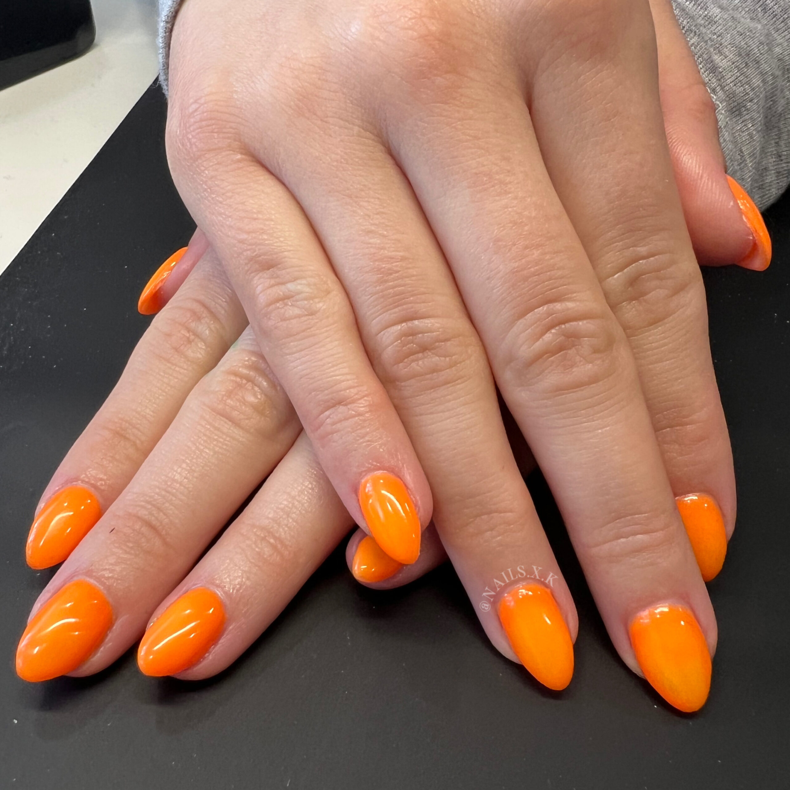 Hard gel nails with a bright aura design. Nails by K